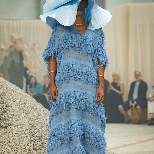 A model poses on the runway at the IAMISIGO show