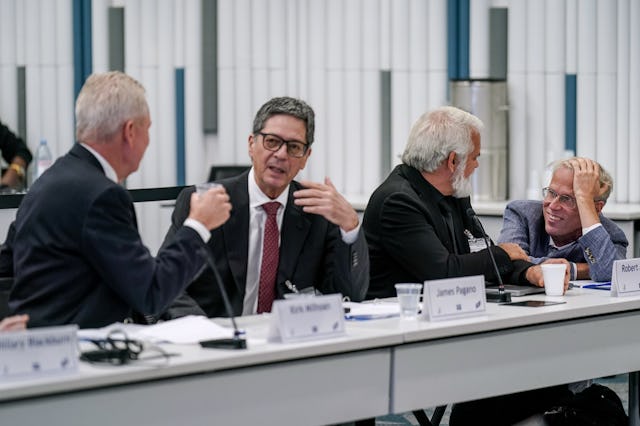 CHAMBLEE, GEORGIA - SEPTEMBER 18: Martin Kulldorff, right, speaks with Robert Malone during a meetin...