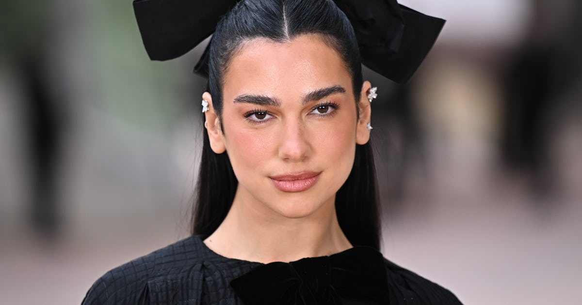Dua Lipa Cosigned 'Showgirl' Orange In A Midriff-Baring Crop Top & $2.1K Gucci Bag