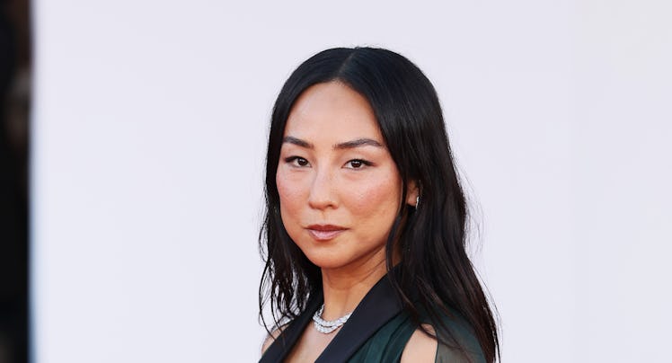 Greta Lee attends "A House Of Dynamite" red carpet during the 82nd Venice International Film Festiva...