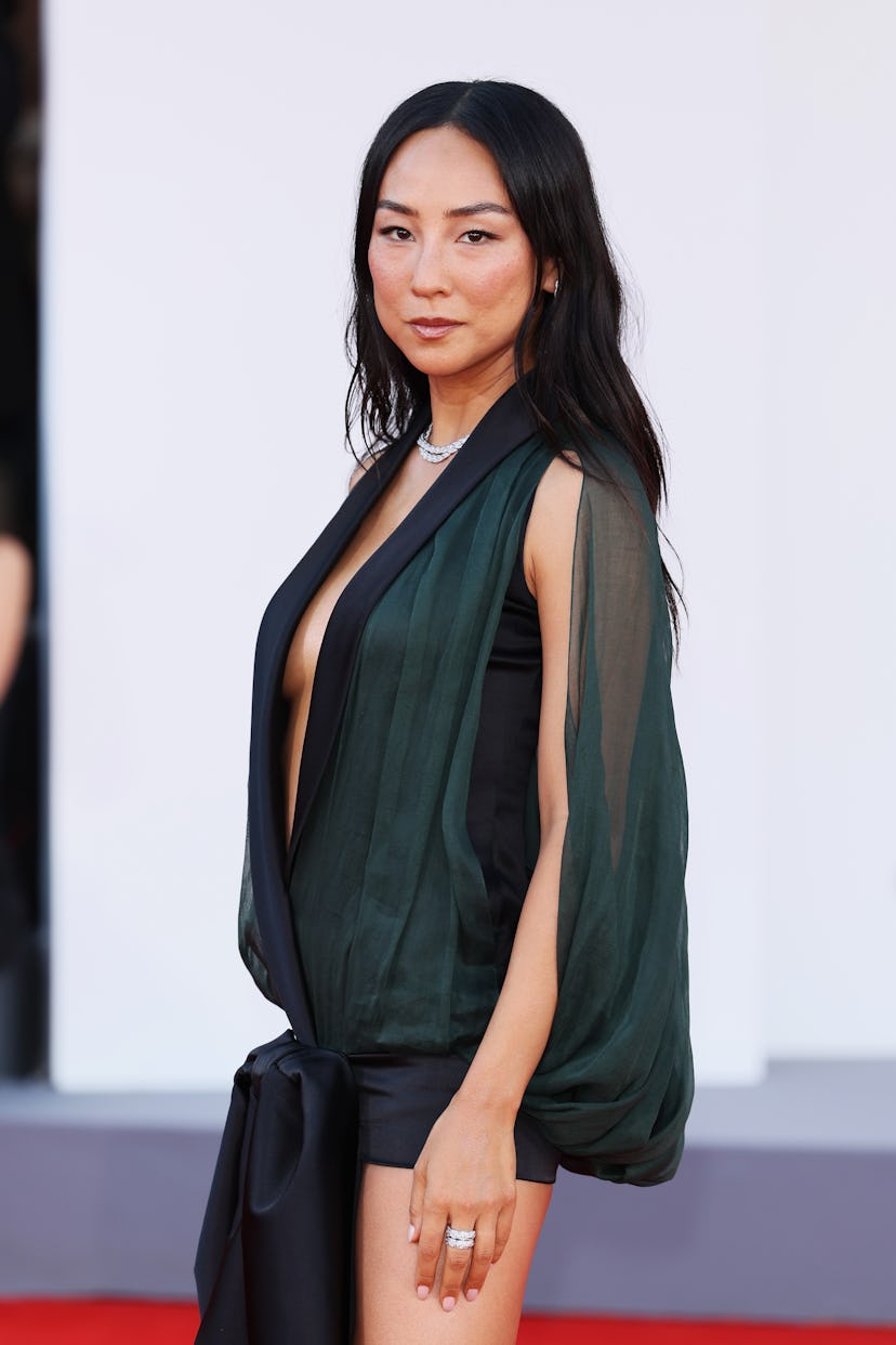 Greta Lee attends "A House Of Dynamite" red carpet during the 82nd Venice International Film Festiva...