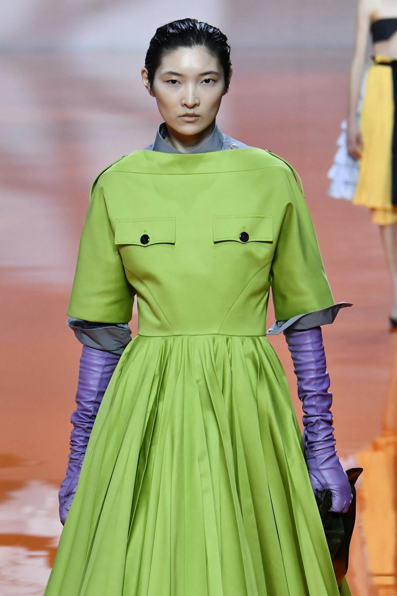 MILAN, ITALY - SEPTEMBER 25: A model walks the runway during the Prada Ready to Wear Spring/Summer 2...