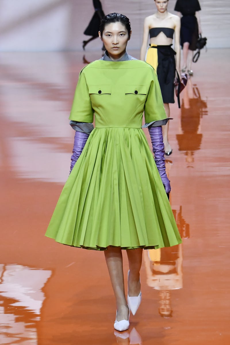 MILAN, ITALY - SEPTEMBER 25: A model walks the runway during the Prada Ready to Wear Spring/Summer 2...