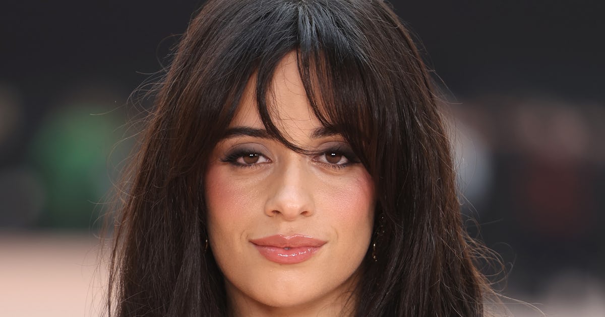 Camila Cabello Wore A Skimpy Cutout Dress In 'Showgirl' Orange
