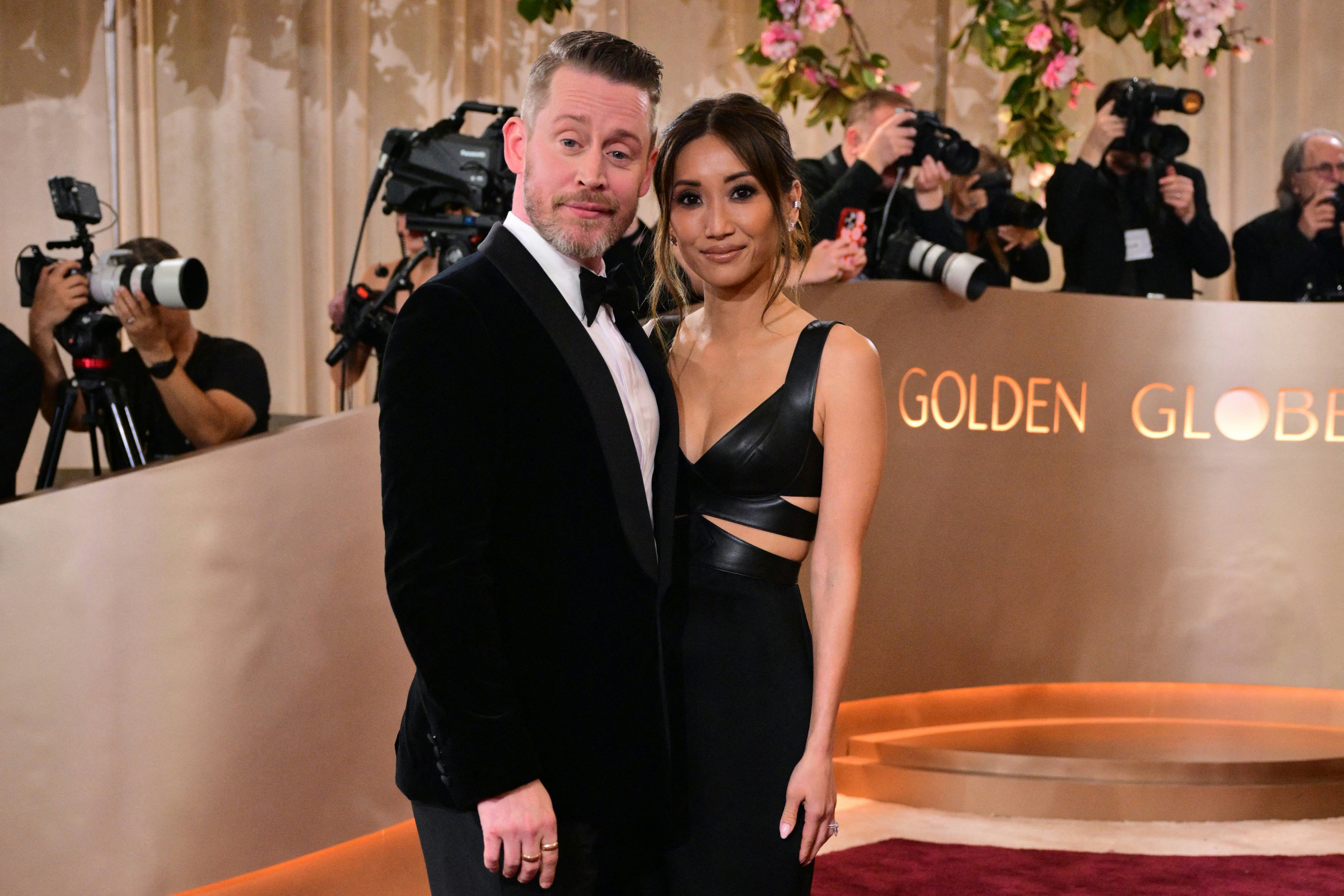 Macaulay Culkin and Brenda Song attend the 83rd annual Golden Globe Awards