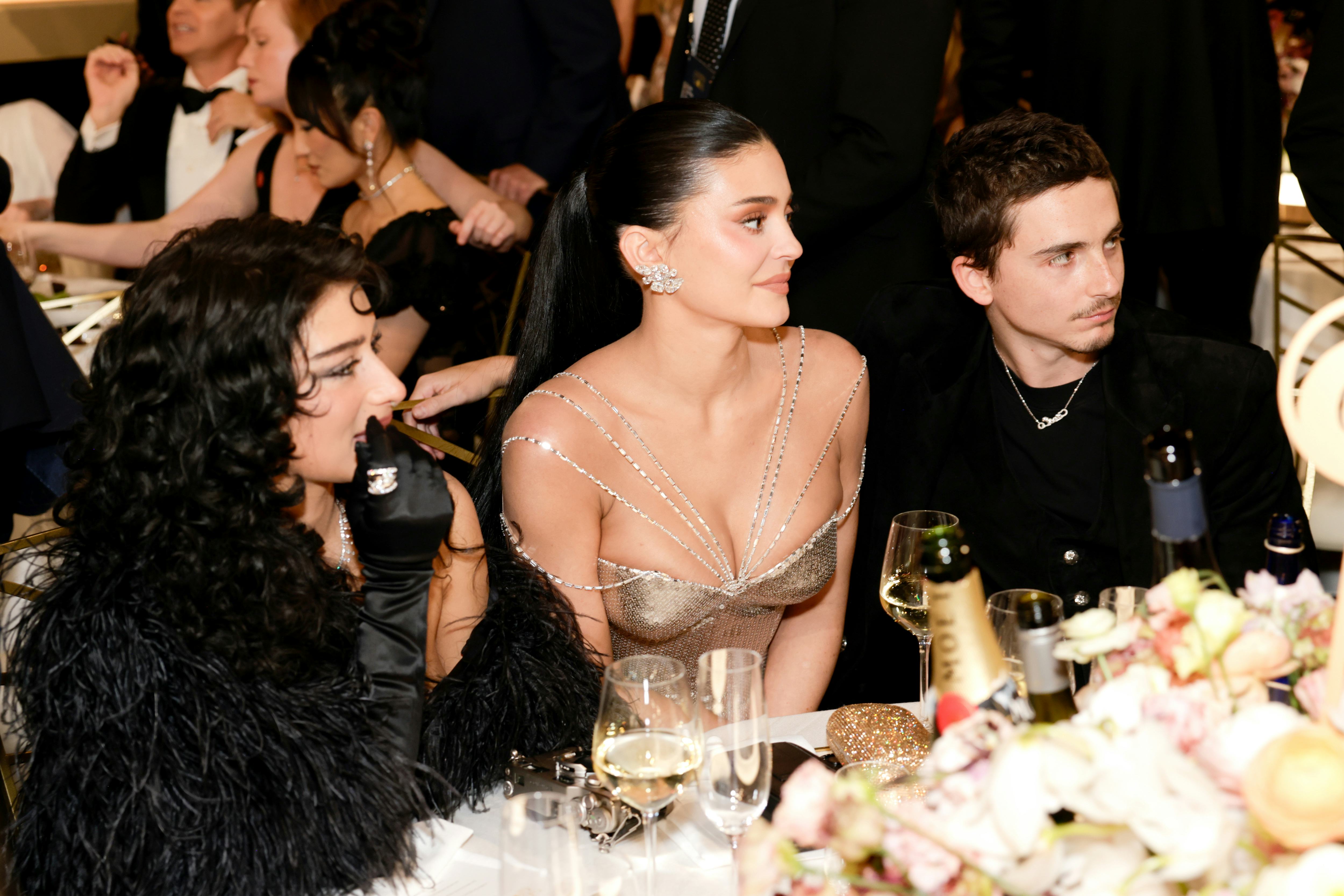 BEVERLY HILLS, CALIFORNIA - JANUARY 11: (L-R) Odessa A'zion, Kylie Jenner and Timothée Chalamet atte...