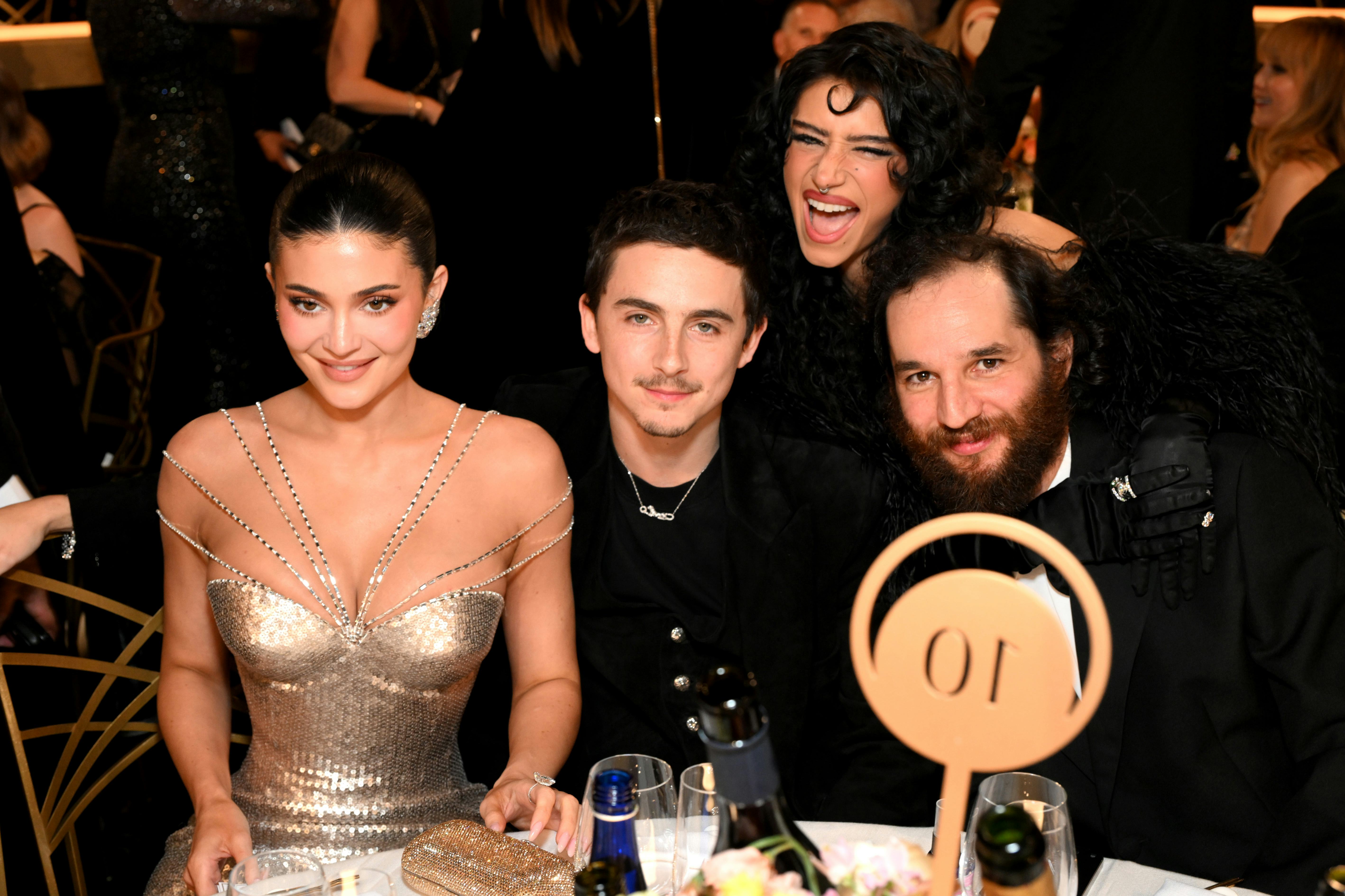 LOS ANGELES, CALIFORNIA - JANUARY 11: (L-R) Kylie Jenner, Timothée Chalamet, Odessa A'zion and Josh ...