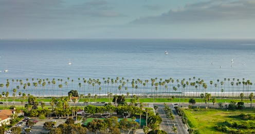 Aerial establishing shot of Pacific Ocean taken from Santa Barbara, California on sunny day.