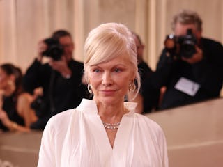 Pamela Anderson spoke about feeling "yucky" near Seth Rogen at the Golden Globes.