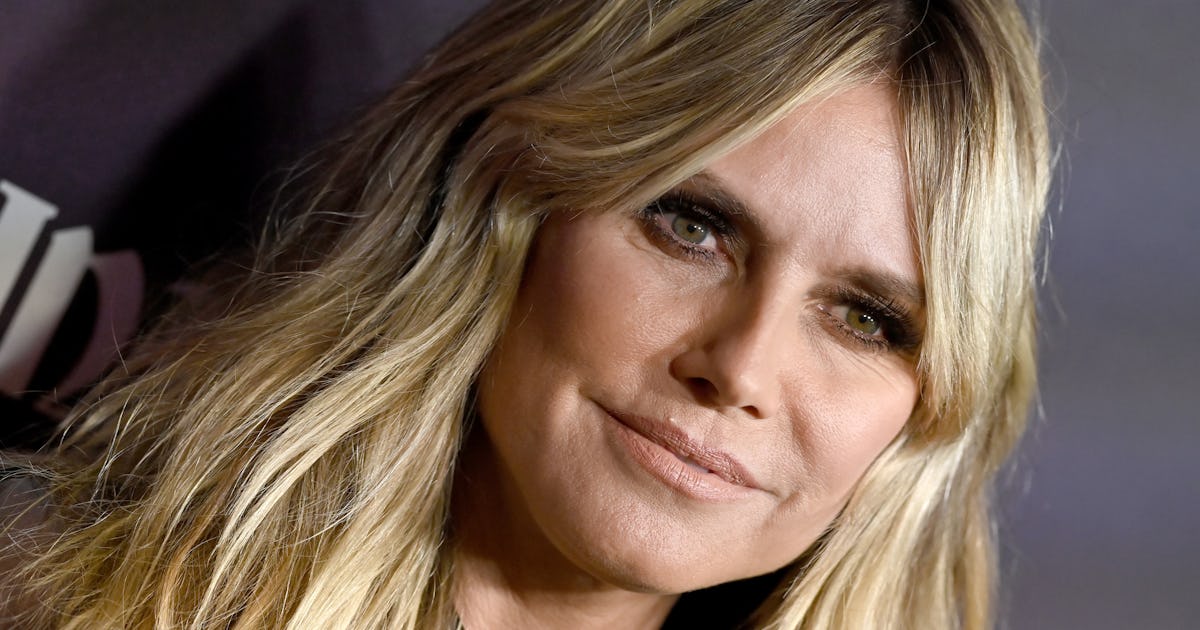 Heidi Klum Wore A Sheer Blouse & Skirt At Paris Hilton's Premiere