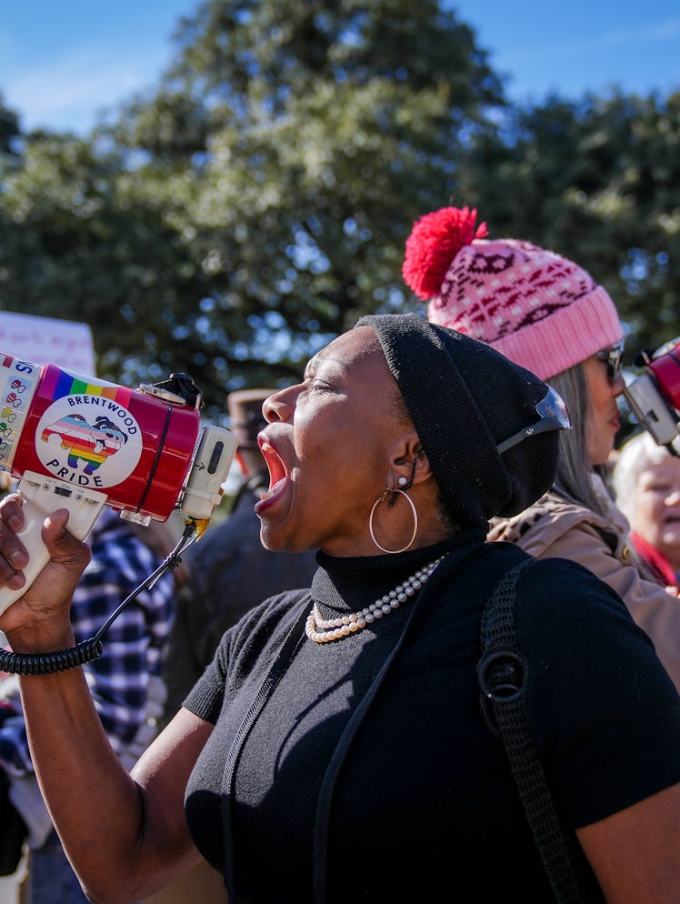 AUSTIN, TEXAS - JANUARY 10: Joycelyn Henderson leads chants on the bullhorn during a rally at Austin...