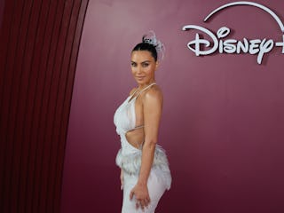 Kim Kardashian reveals she's a fan of specific Taylor Swift songs.