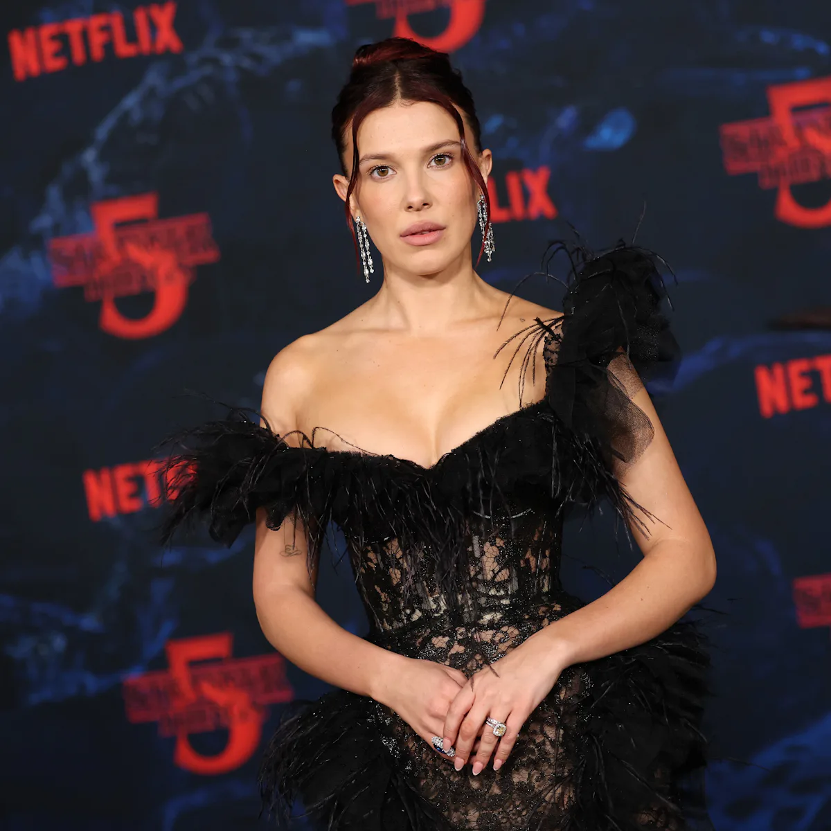 millie bobby brown brown dress Millie Bobby Brown Goes Method at 'Stranger Things 5' LA Premiere