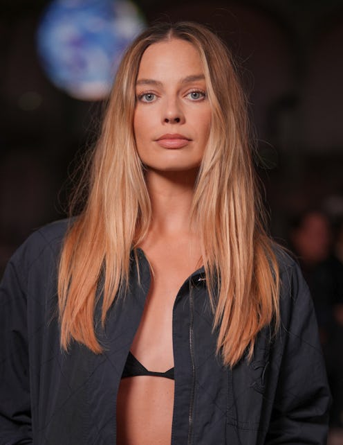 Margot Robbie with long straight hair at the Chanel show