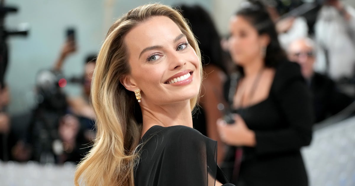 Margot Robbie's Feathery Mini Was Inspired By This Line In 'Wuthering Heights'