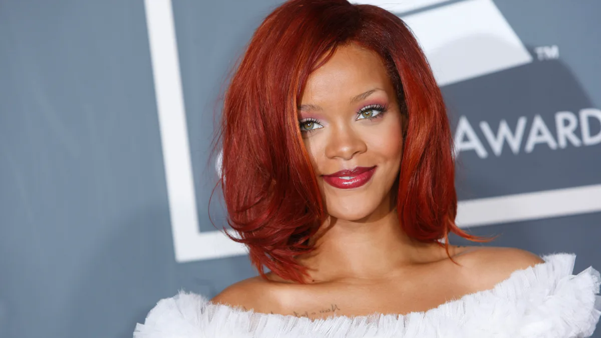 rihanna red dress grammys Rihanna Cancels Her Grammy Performance But Makes a Big Fashion Statement