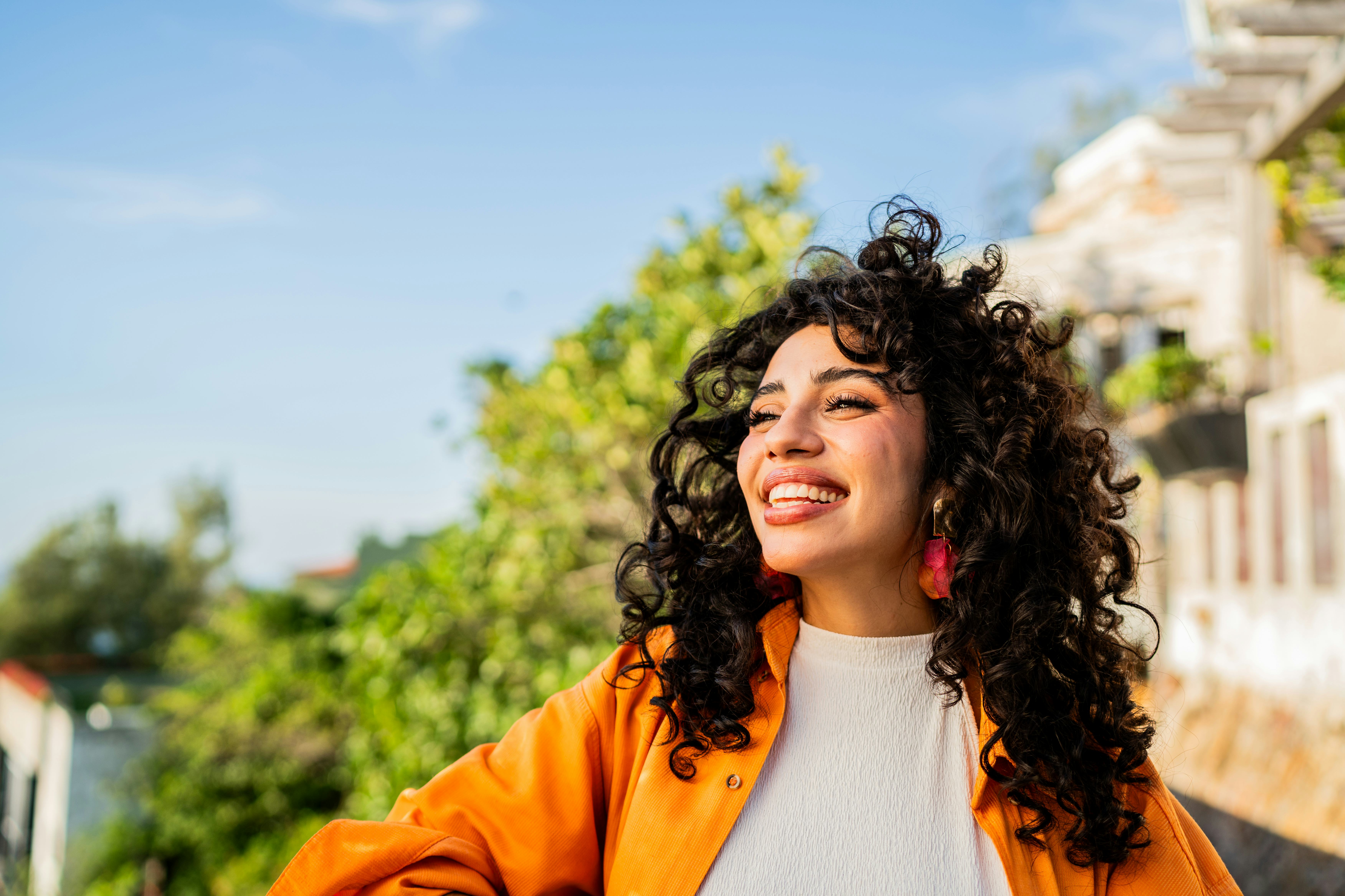 Young woman contemplating outdoors