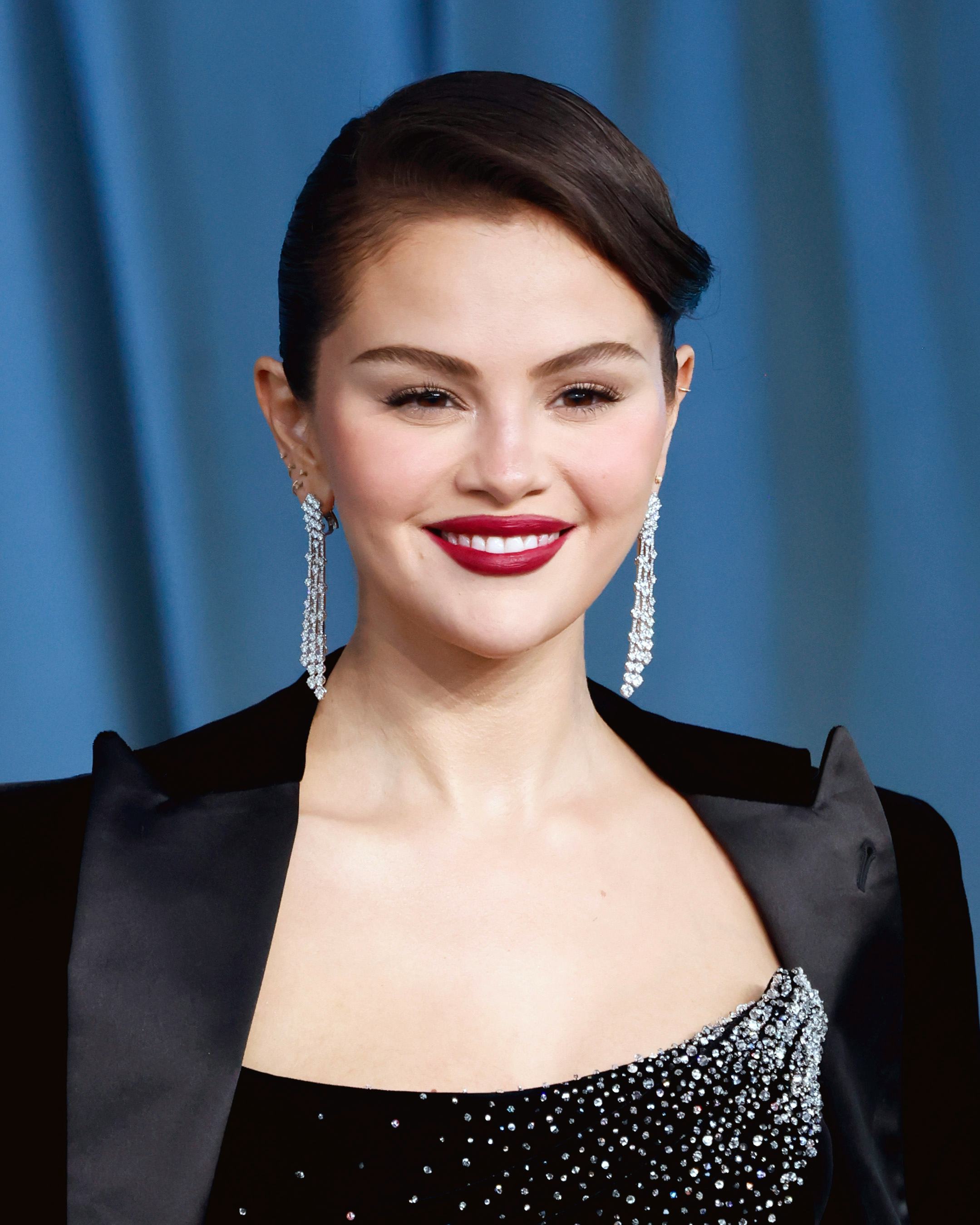 Selena Gomez with red lipstick in close up