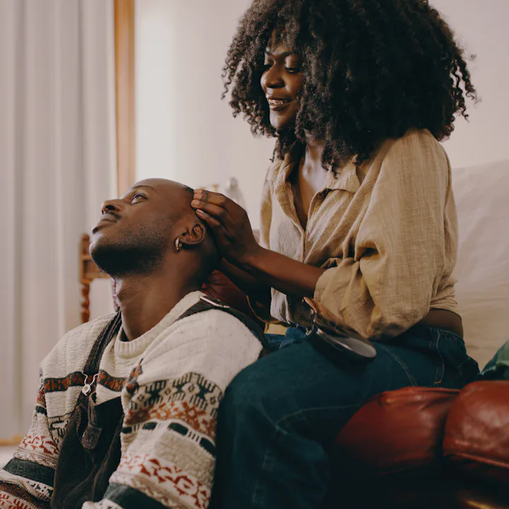 Shot of a young couple spending quality time in the living room at home