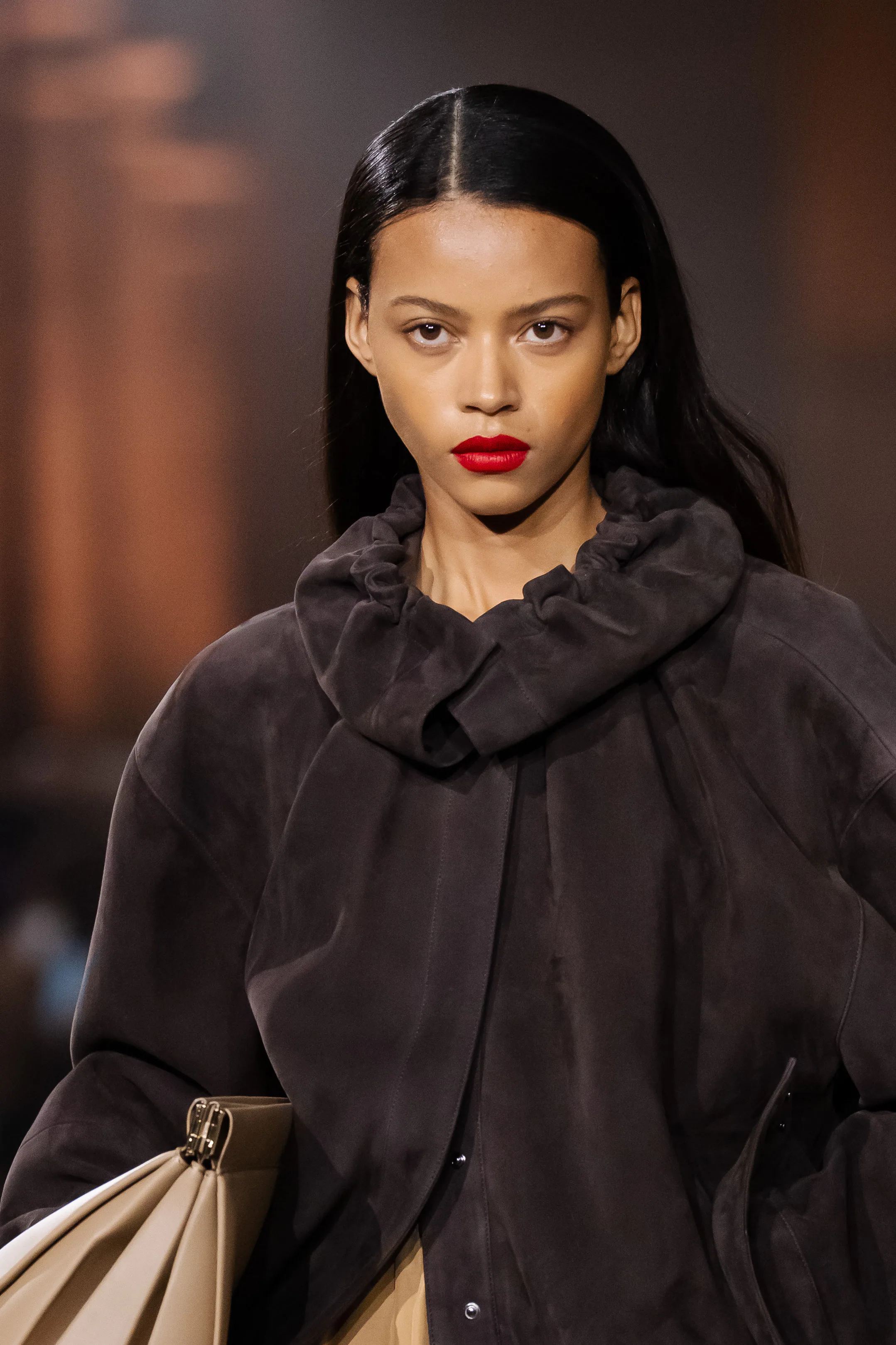 A model at the Victoria Beckham show with a bold red lip