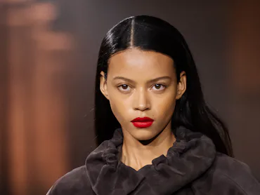 A model at the Victoria Beckham show with a bold red lip