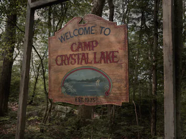 CRYSTAL LAKE -- "Crystal Lake Sign" -- Pictured: Camp Crystal Lake -- (Photo by: Matt Infante/Peacoc...