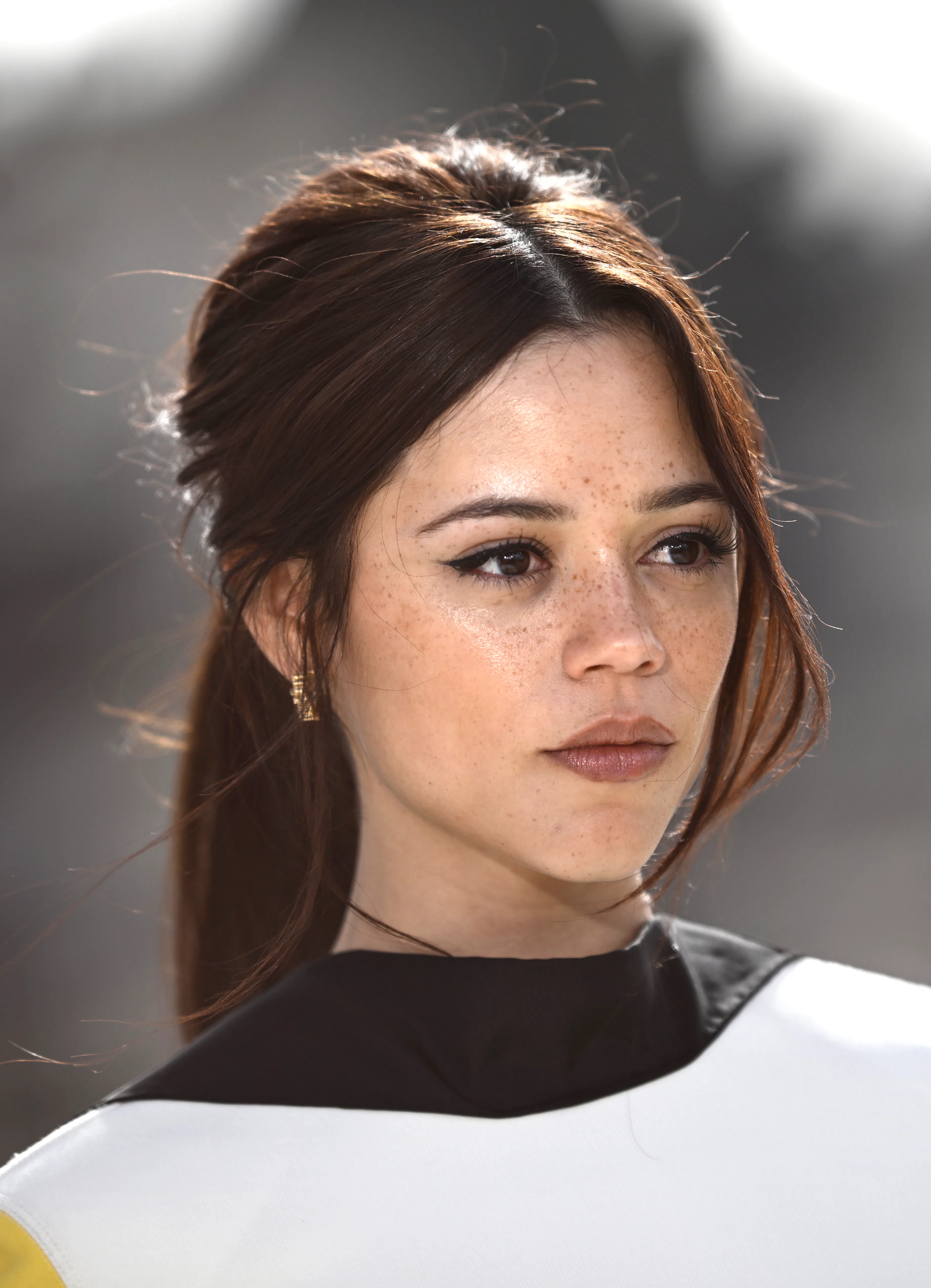 Jenna Ortega attends the photocall for "Klara And The Sun" with a cool-toned nude lip