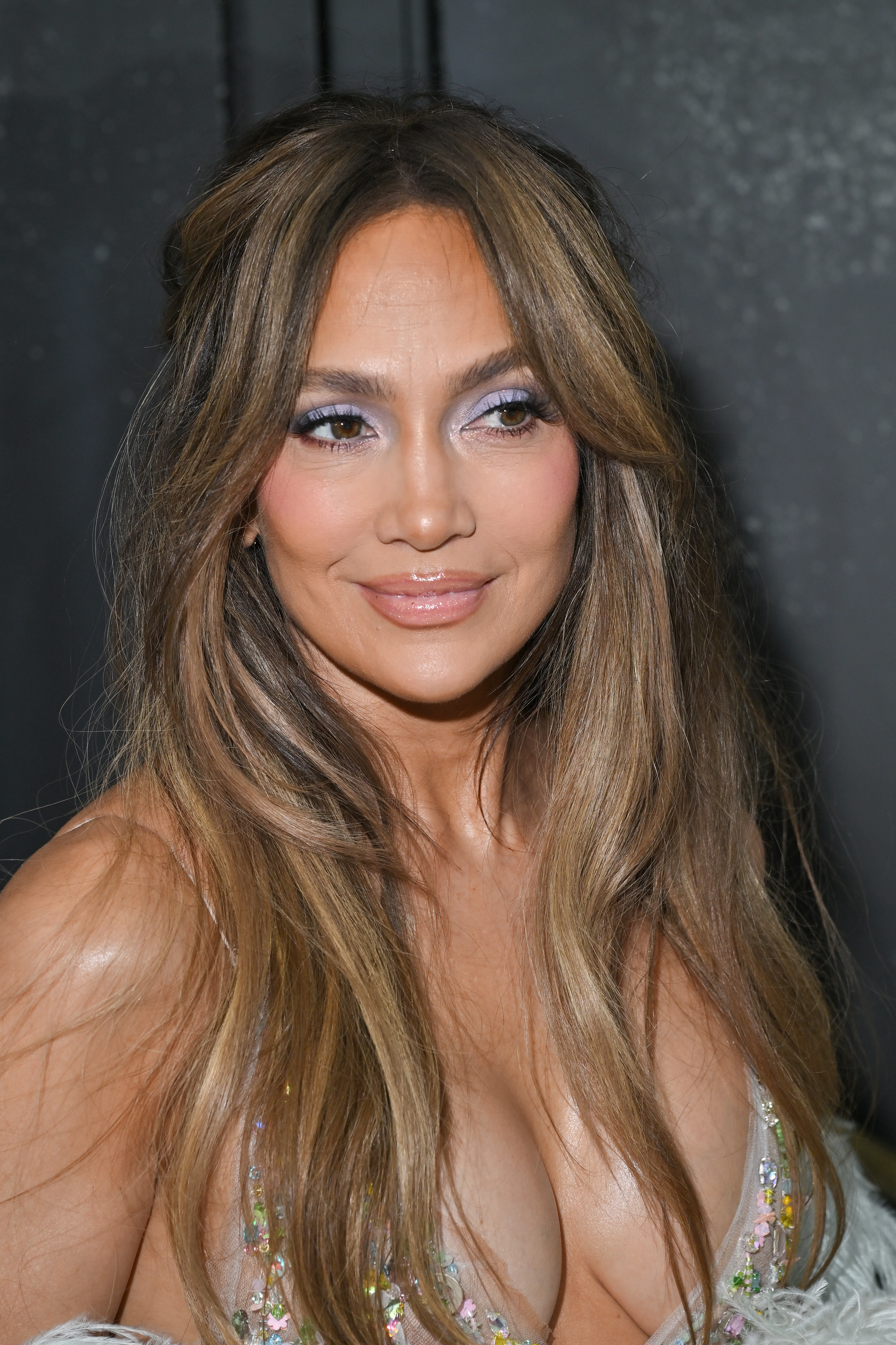 Jennifer Lopez with frosted purple eye makeup