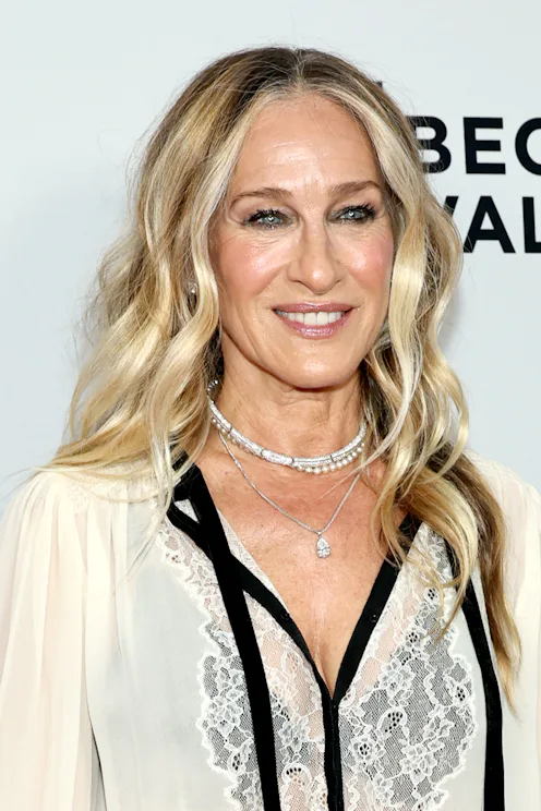 Sarah Jessica Parker, in close up, her hair down at an event in New York City