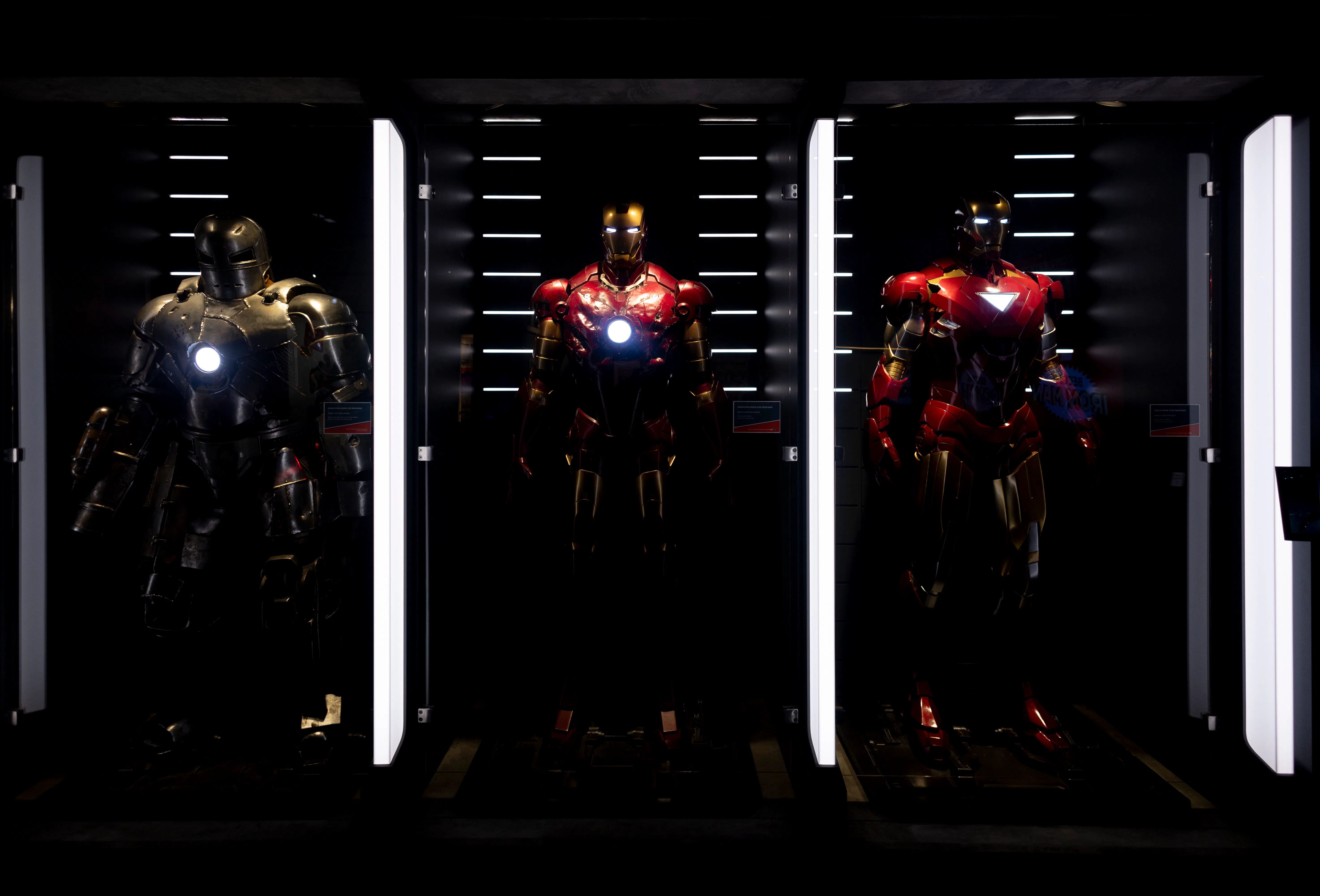 MADRID, SPAIN - NOVEMBER 22: Three Ironman figures in the exhibition 'Marvel: Universe of Super Hero...