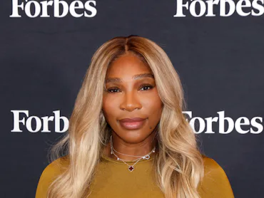 Serena Williams at a Forbes event with long, buttery blonde hair