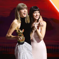 Taylor Swift and Dakota Johnson onstage as Swift accepts the Artist Director Honors at 2026 MTV Vide...