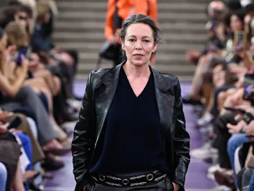 Actress Olivia Colman on the runway at the Miu Miu fashion show as part of Paris RTW Spring/Summer 2...