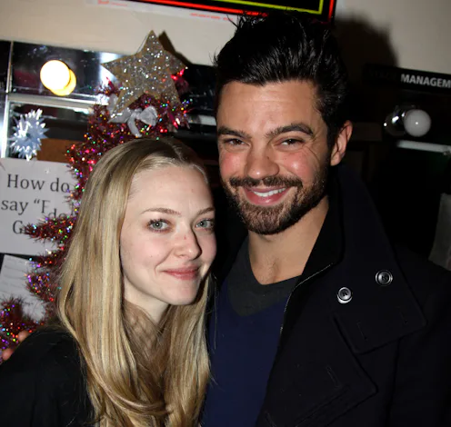 Amanda Seyfried and boyfriend Dominic Cooper pose backstage at the hit rock musical "Rock of Ages" o...