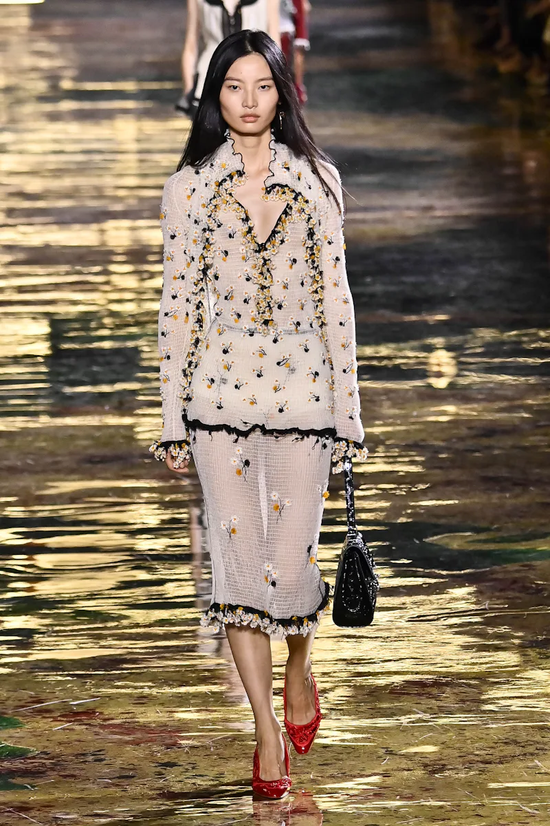PARIS, FRANCE - OCTOBER 05: A model walks the runway during the Chanel Ready to Wear Spring/Summer 2...