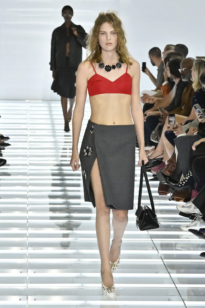MILAN, ITALY - SEPTEMBER 22: A model walks the runway at the Prada fashion show during the Milan Fas...