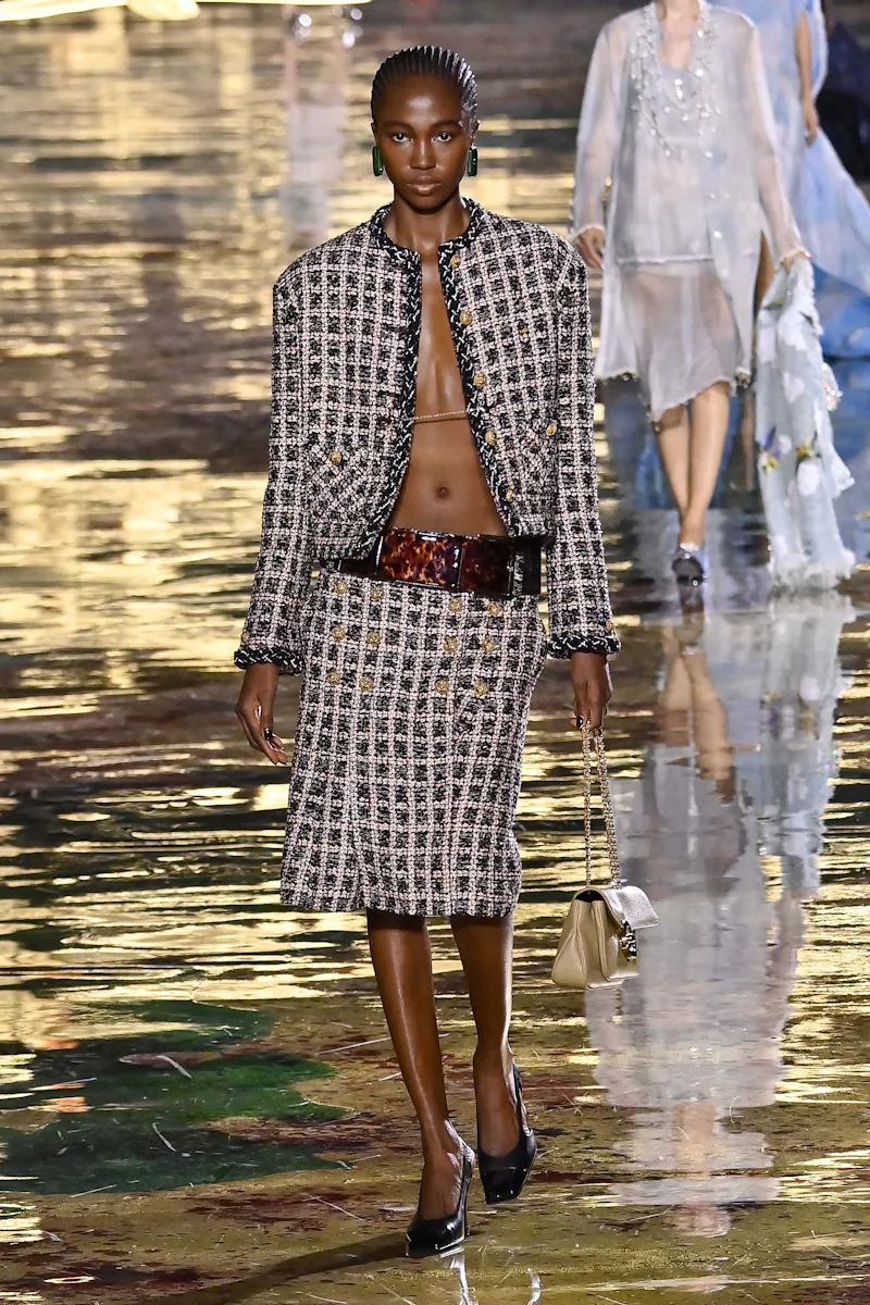 PARIS, FRANCE - OCTOBER 05: A model walks the runway during the Chanel Ready to Wear Spring/Summer 2...