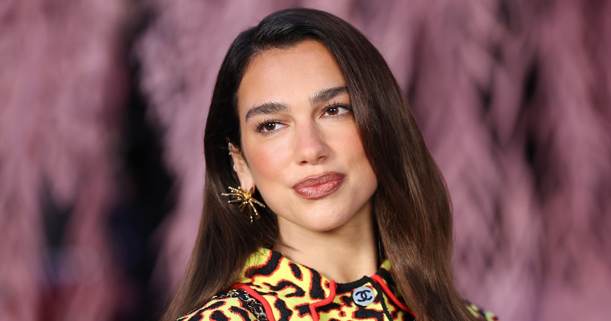 Dua Lipa Aced Vacay Dressing In A Sheer Lace Top & Slinky LBD