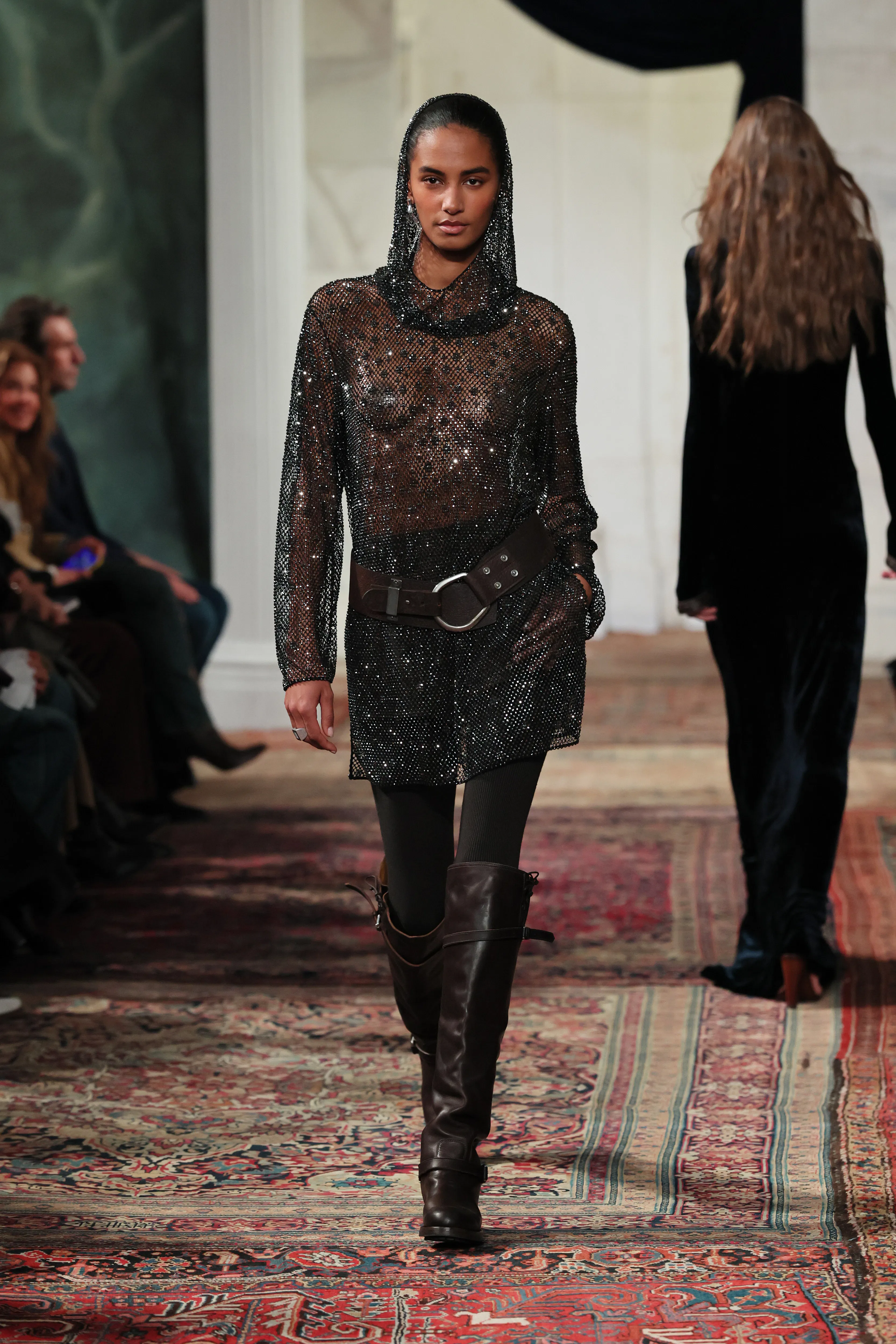 Sacha Quenby walks the runway for the Ralph Lauren fashion show 