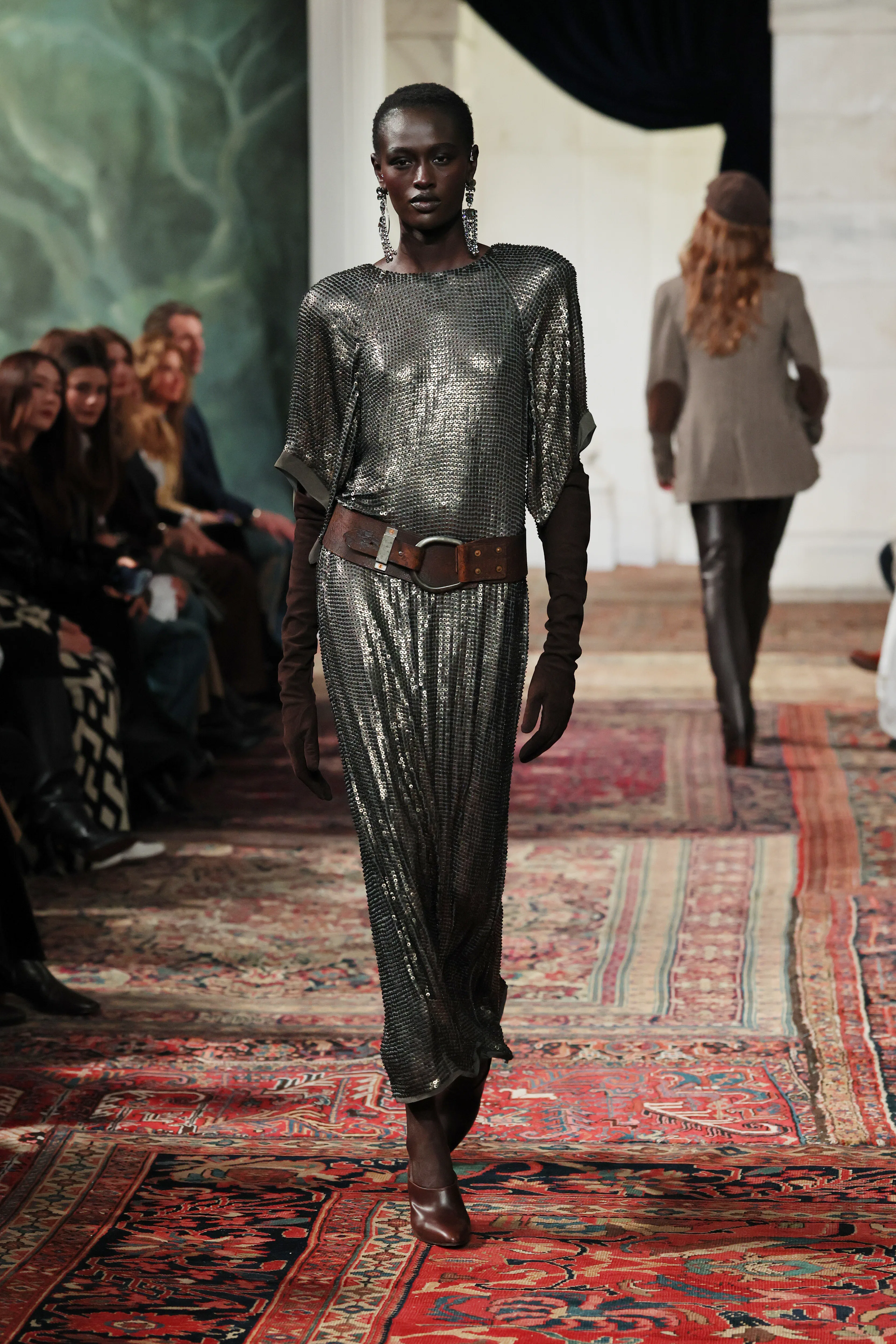 A model walks the runway for the Ralph Lauren fashion show 