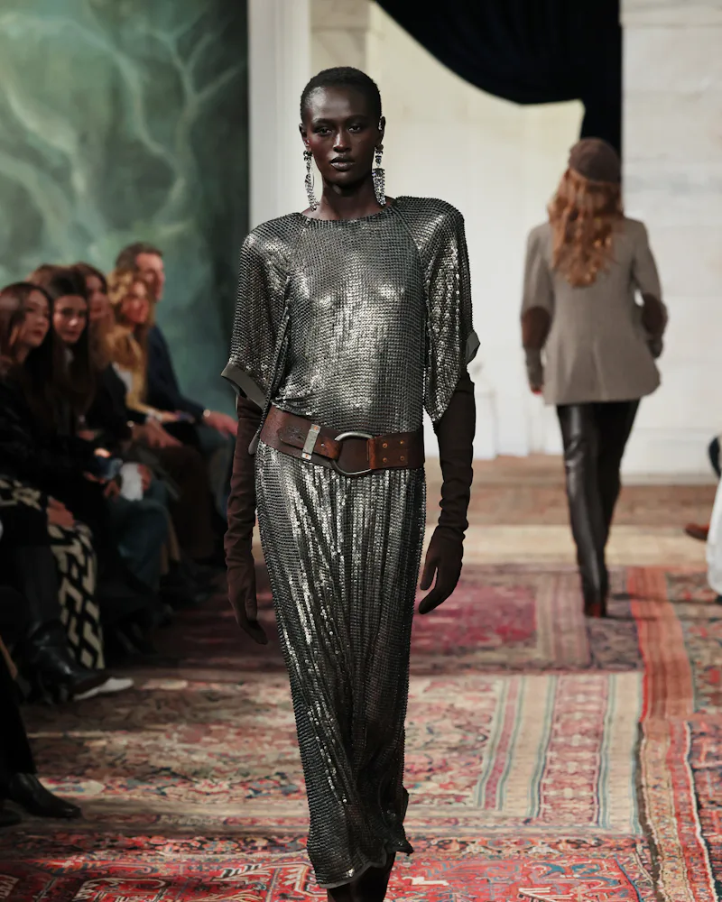 A model walks the runway for the Ralph Lauren fashion show