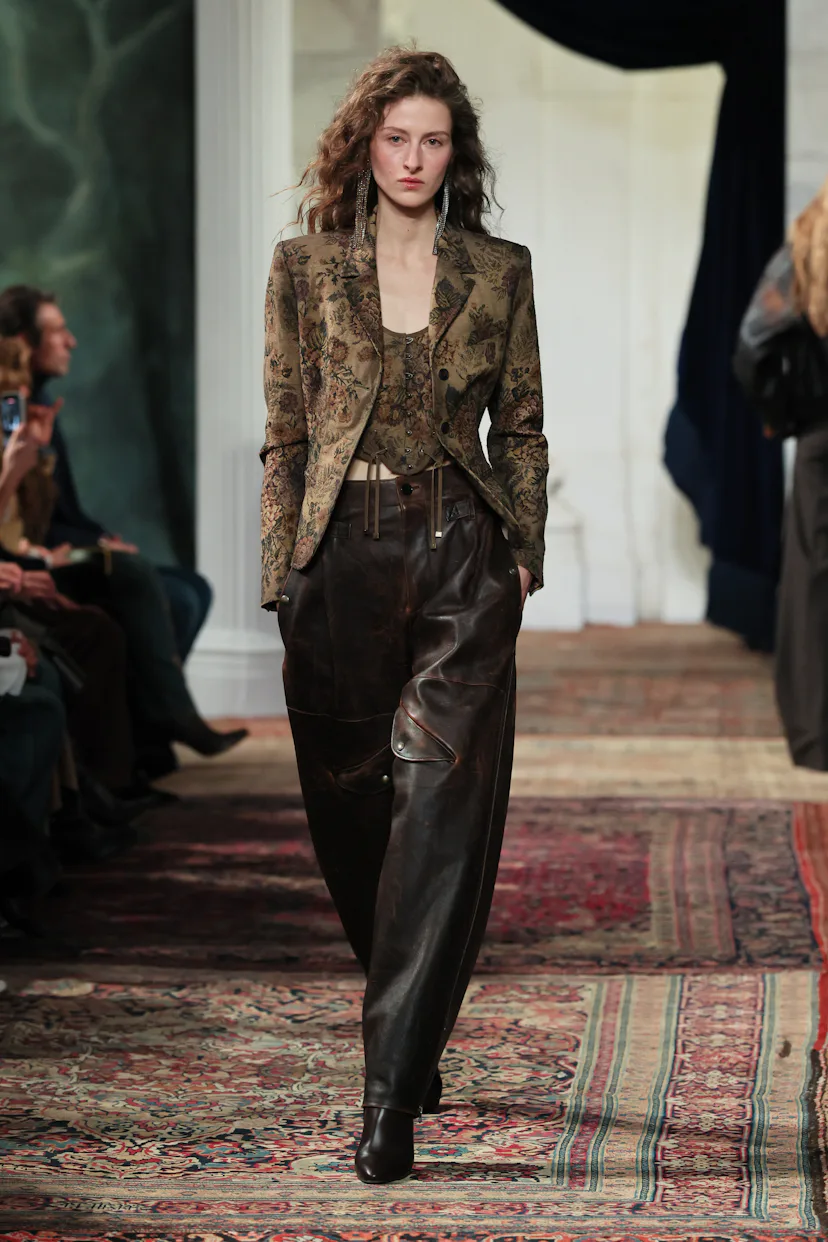 A model walks the runway for the Ralph Lauren fashion show