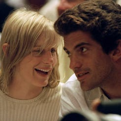 UNITED STATES - JUNE 12: John F. Kennedy Jr. and girlfriend Darryl Hannah watch game between the Ne...