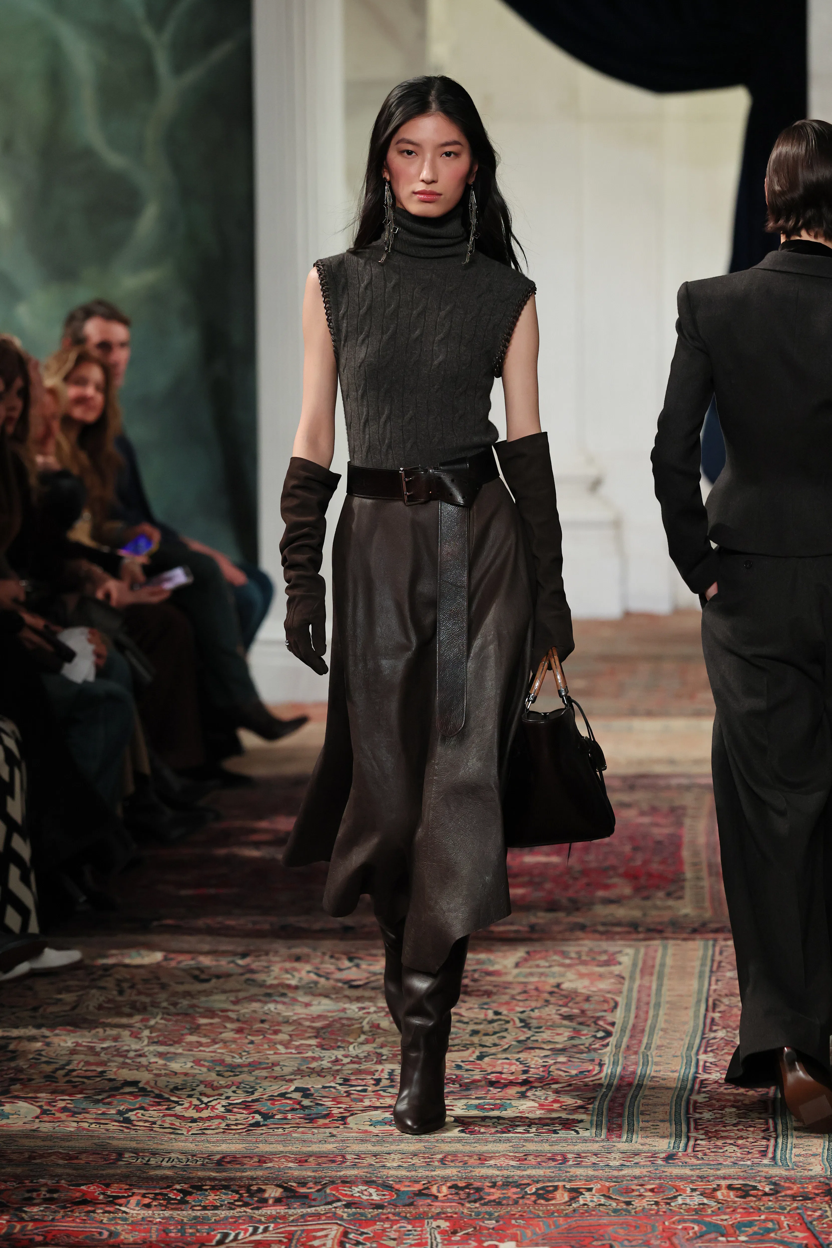 A model walks the runway for the Ralph Lauren fashion show 