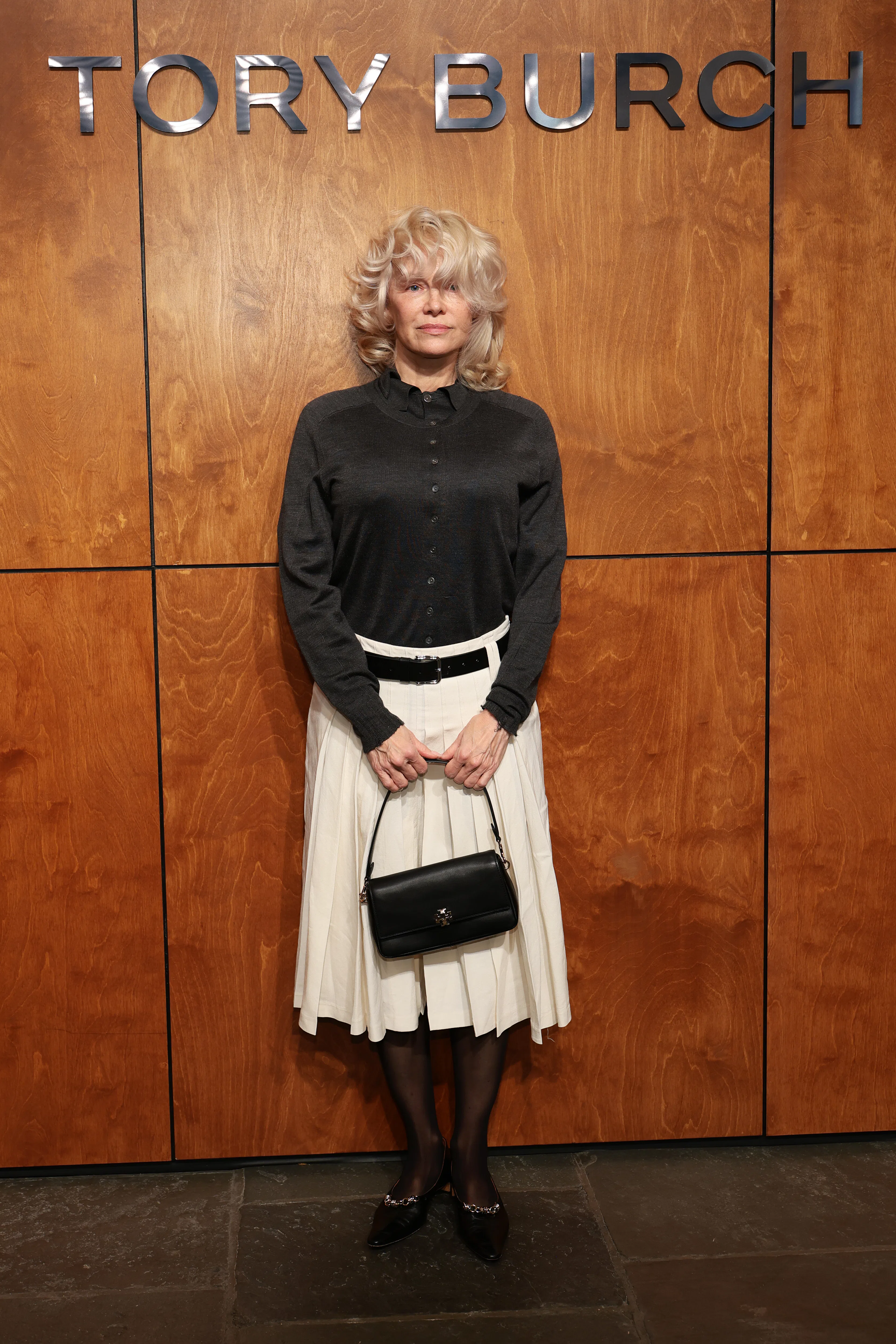 NEW YORK, NEW YORK - FEBRUARY 11: Pamela Anderson attends Tory Burch Fall/Winter 2026 during New Yor...