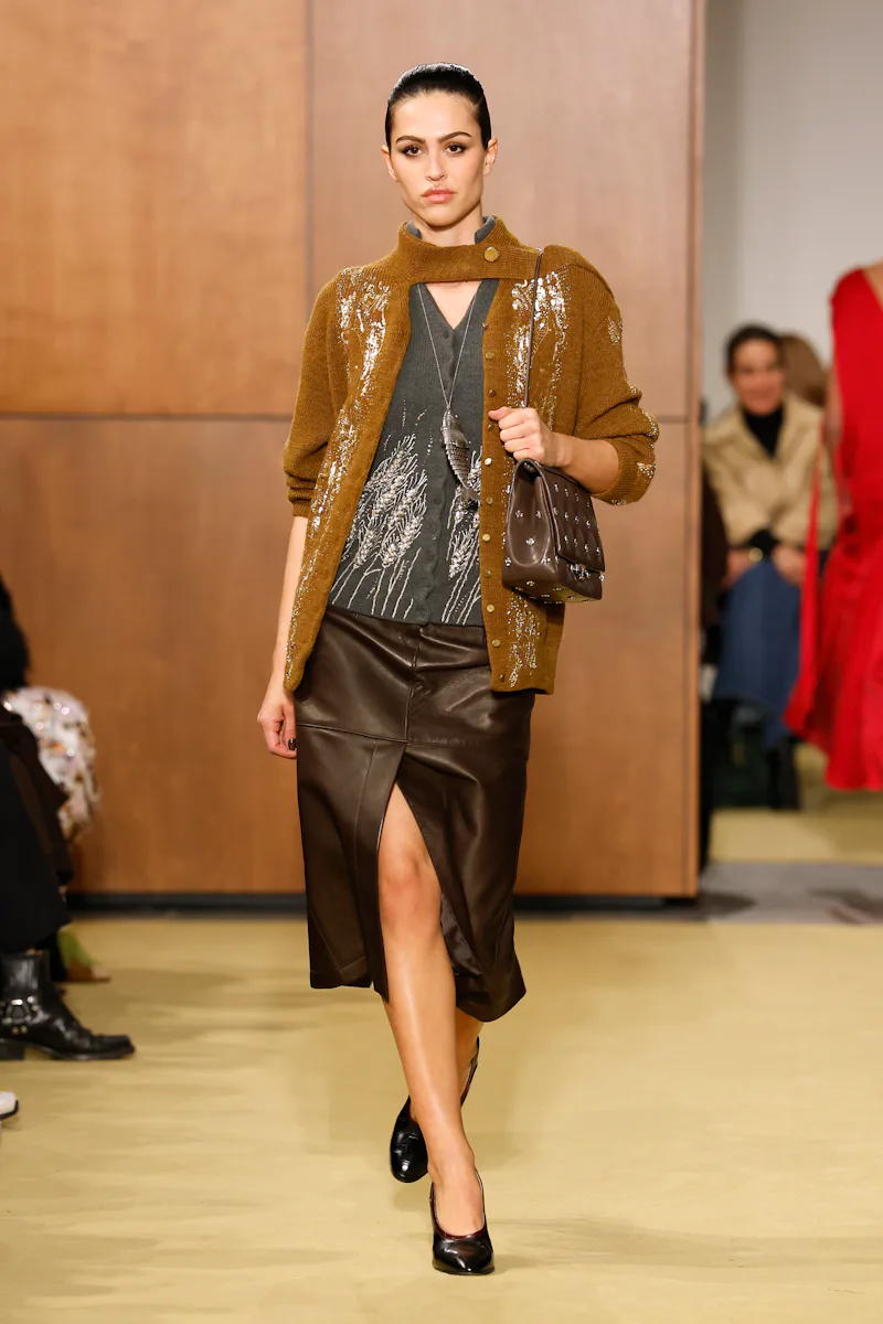 NEW YORK, NEW YORK - FEBRUARY 11: A model walks the runway at the Tory Burch show during the New Yor...