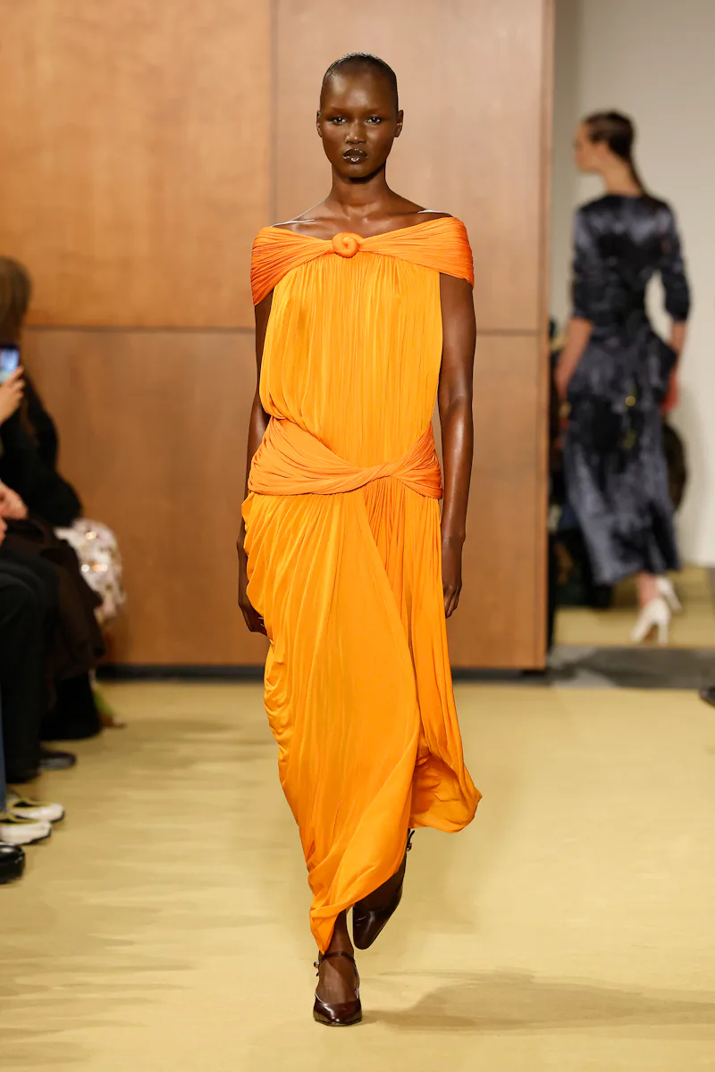 NEW YORK, NEW YORK - FEBRUARY 11: A model walks the runway at the Tory Burch show during the New Yor...