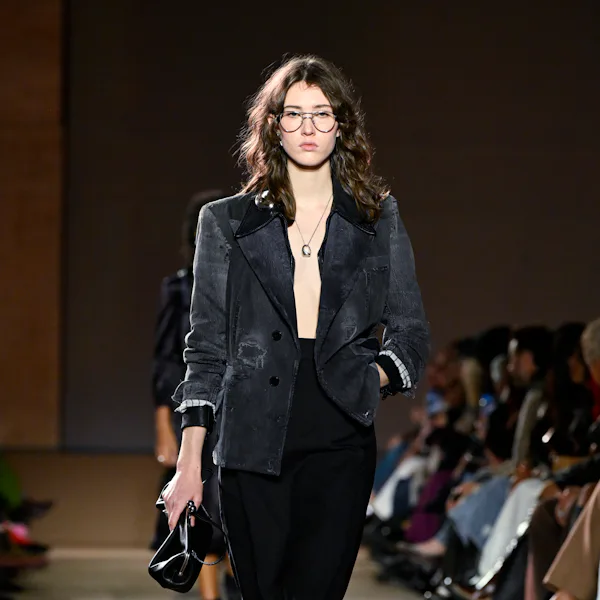 Model on the runway at the Coach fashion show as part of RTW Fall 2026