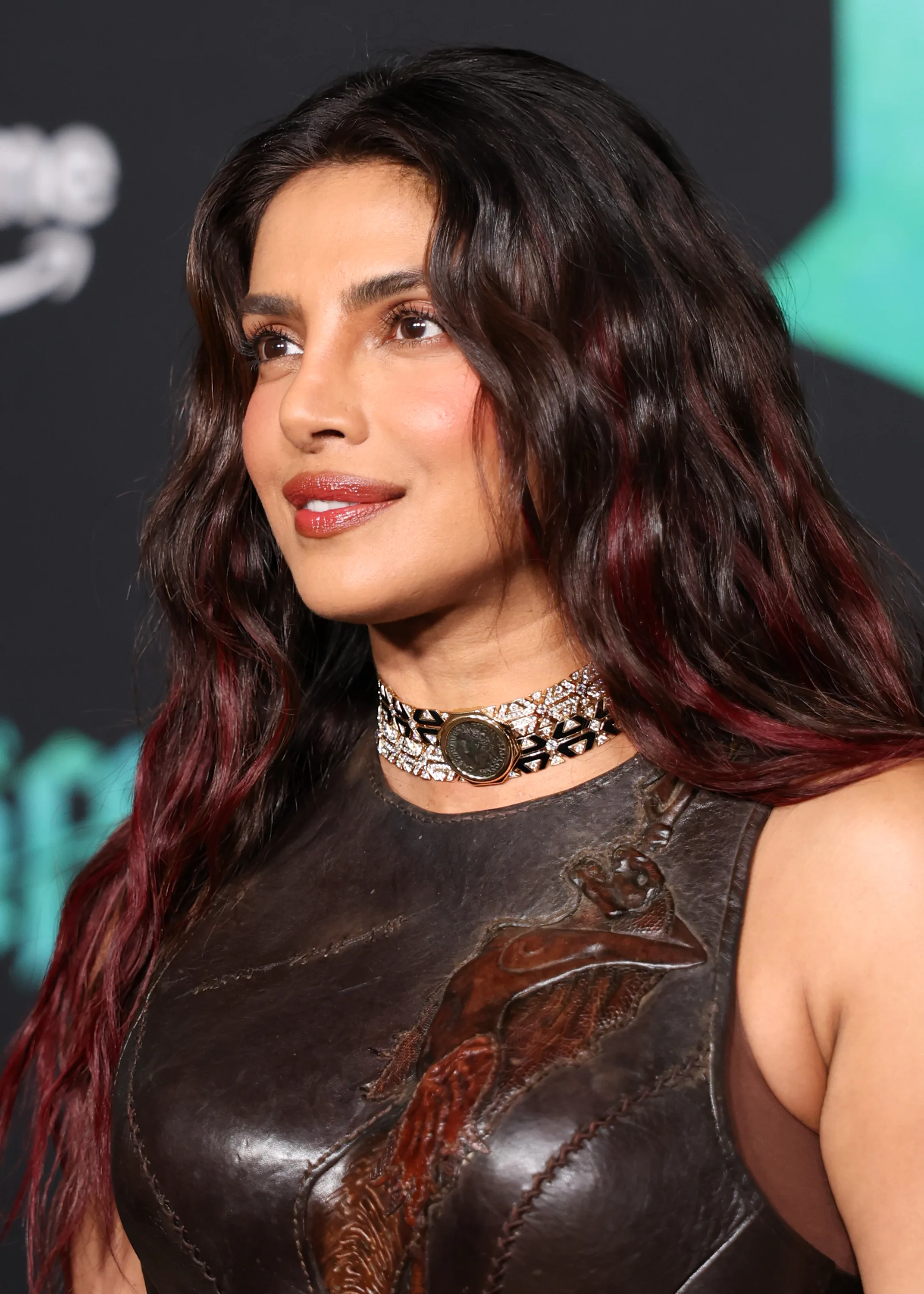 Priyanka Chopra with wine red highlights at her film premiere