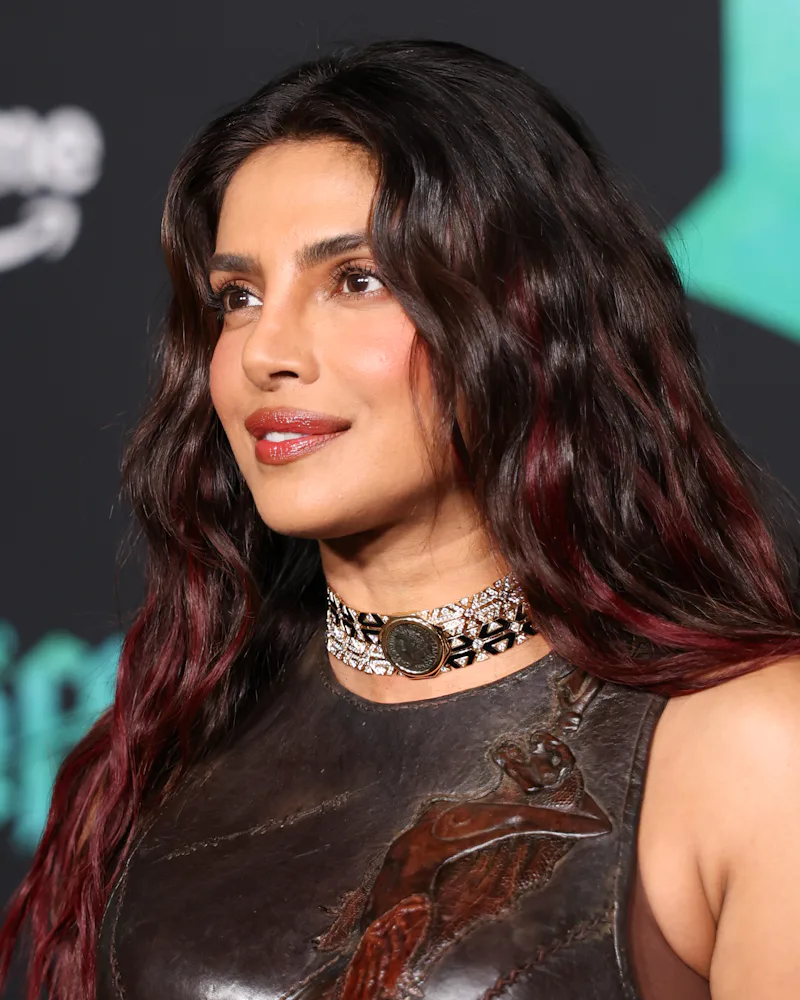 Priyanka Chopra with wine red highlights at her film premiere